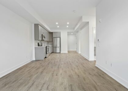 brown wooden parquet floor and white wall