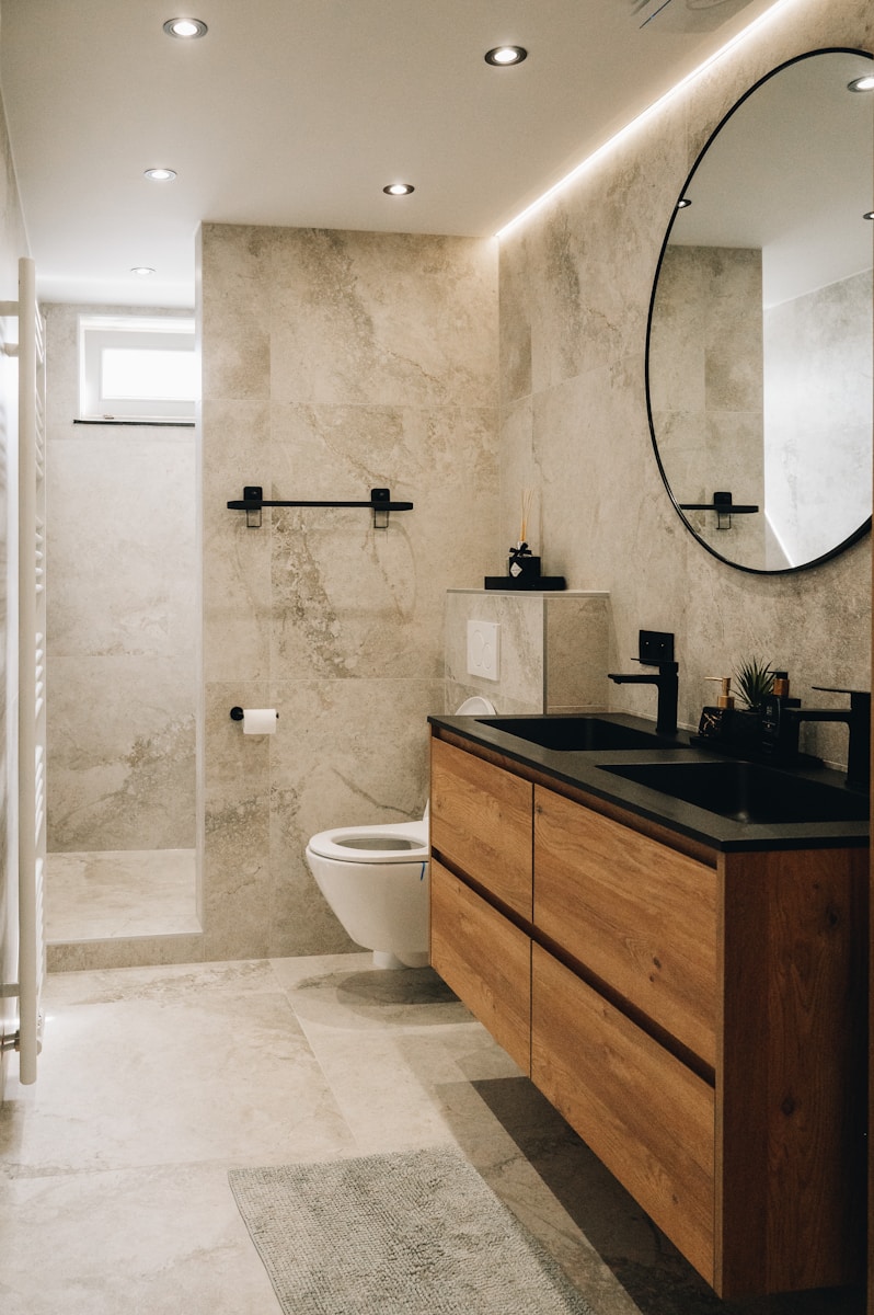 a bathroom with a large mirror